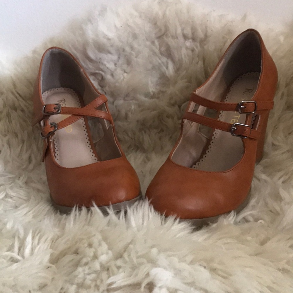 Cute tan heeled double buckle cut out shoes